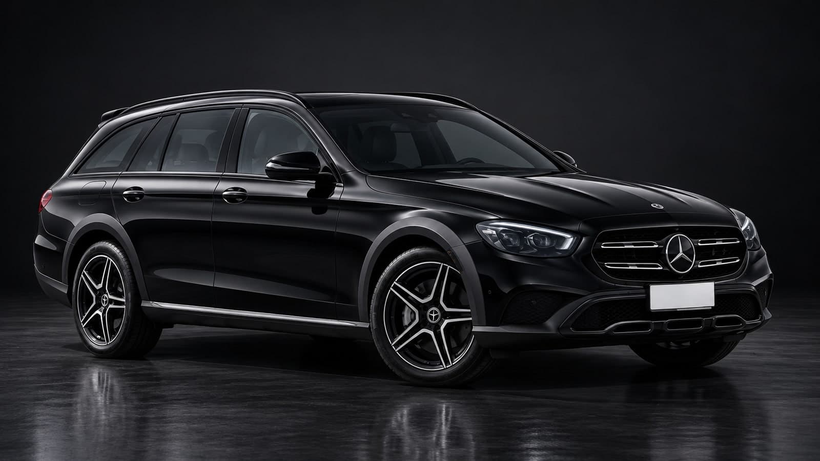 Black Mercedes E-Class Estate, front three-quarter view